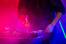 Closeup Of Dj Hand Playing On Turntable In Nightclub,  People With Party Concept.
