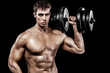 © Mike Orlov - Athletic shirtless young sports man - fitness model holds the dumbbell in gym. Copy space fore your text.
