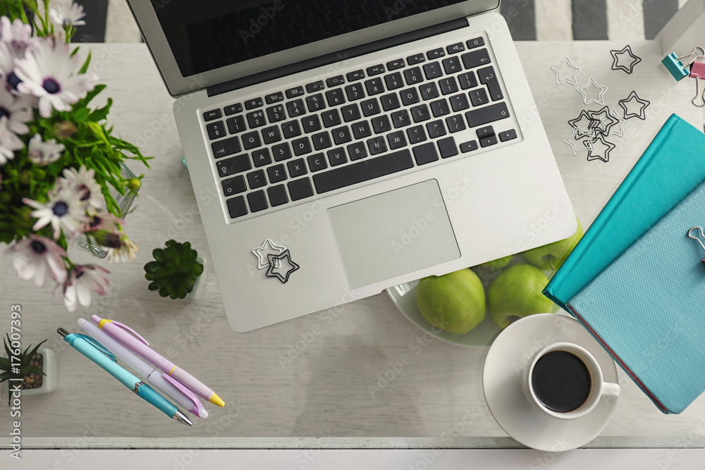 Comfortable workplace with modern laptop on table