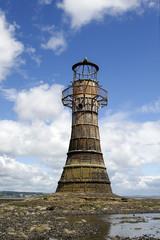 Wall Mural - Whiteford Lighthouse is listed by Cadw as Grade II* A wave-swept cast-iron lighthouse in British coastal waters and an important work of cast-iron engineering and nineteenth-century architecture.