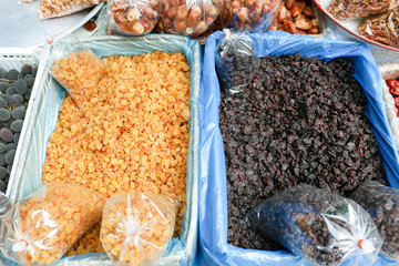 Dried grape, raisin for sell at local shop at Sriyan market, Bangkok, Thailand