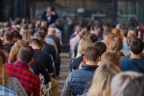 Audience listens to the lecturer at the conference hall Wallpaper Mural