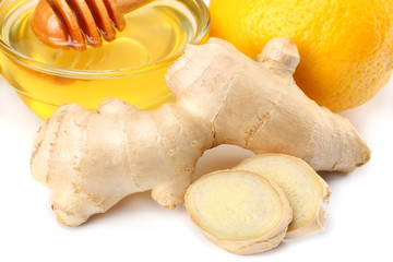 Sticker - healthy background. ginger with lemon and honey isolated on white background close up