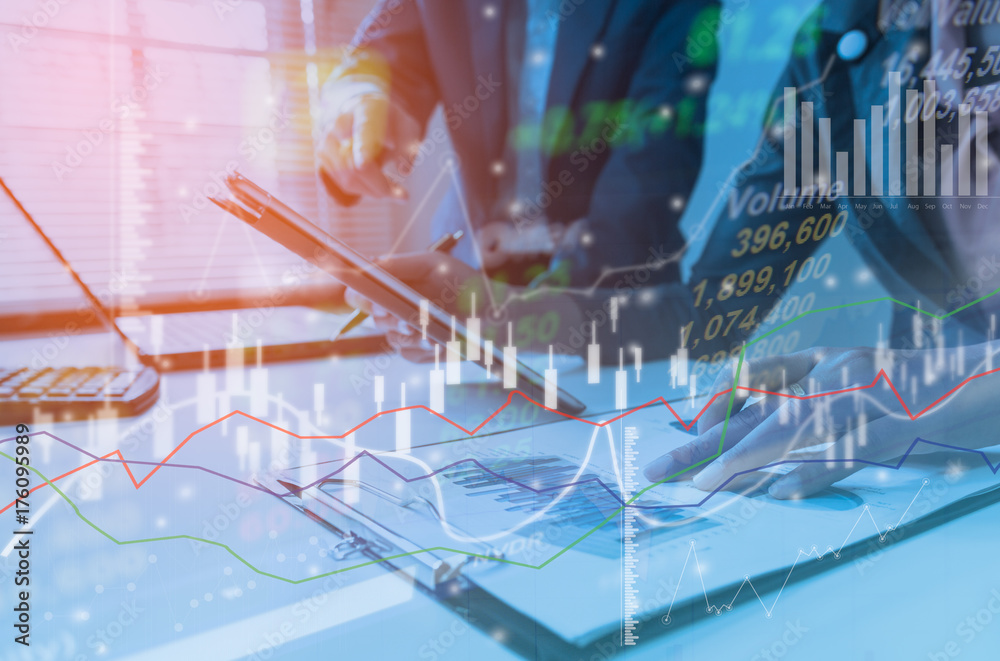 Business strategy invesment consept : Two businessman confident executive colleagues meeting and discussing at office with profit graph background.