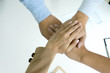 © sabthai - Hand together group office teamwork