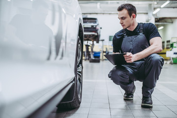 Handsome auto service mechanic