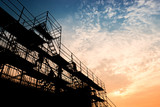 Fototapeta  - Civil engineer and safety officer in spec steel truss structure scaffolding risk analysis in construction site