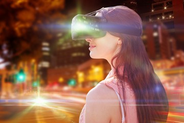 Poster - Composite image of side view of young woman looking through