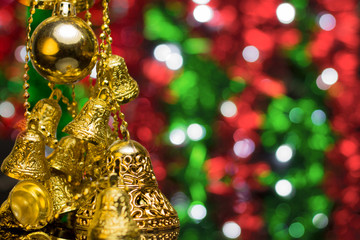 Wall Mural - Christmas decoration on a golden background. bokeh background and dark mirror floor.