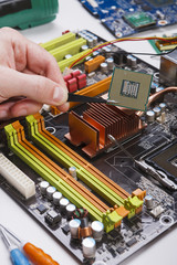 Poster - Technician plug in microprocessor to motherboard