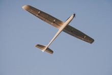 RC Glider Flying In The Blue Sky