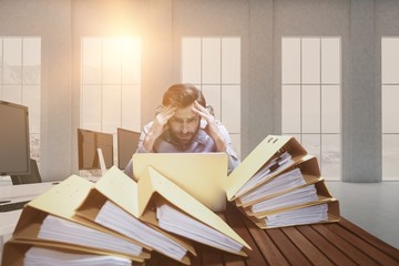 Fototapete - Composite image of frustrated businessman with head in hands