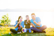 © Nichizhenova Elena - Happy family outside