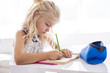 © Louis-Paul Photo - little girl drawing in the kitchen table