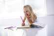 © Louis-Paul Photo - little girl drawing in the kitchen table