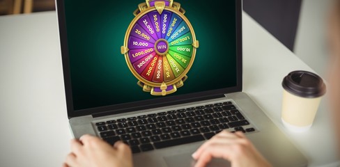 Poster - Composite image of graphic image of wheel of fortune on mobile