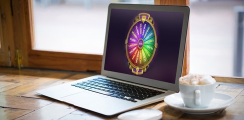 Poster - Composite image of colorful wheel of fortune on mobile screen