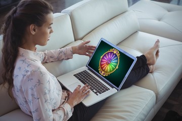 Poster - Composite image of graphic image of wheel of fortune on mobile