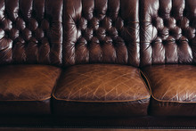 Old Run Down Leather Sofa Close Up