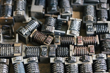 Close Up Of Vintage Metal Numbering Inserts For Printer