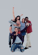 Happy group of people with arms up - isolated over white