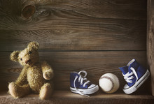 Little Running Shoes With Teddy Bear On Shelf