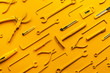 © Marko/Stocksy - yellow work/handtools of a craftsman arranged.