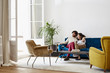 © altoimages/Stocksy - Couple Having Wine While Sitting On Sofa