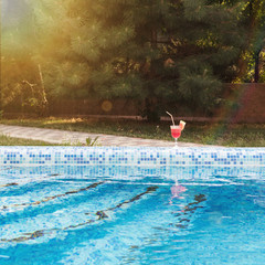 Wall Mural - Water melon cocktail at the pool in sunny day