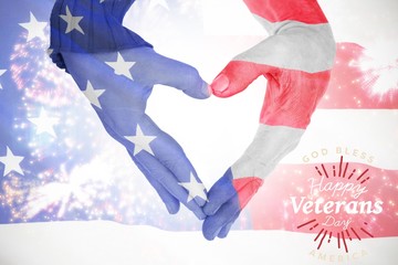 Poster - Composite image of close up of hands forming heart