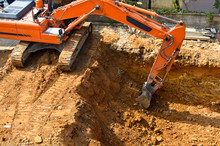 Excavator In Construction Site