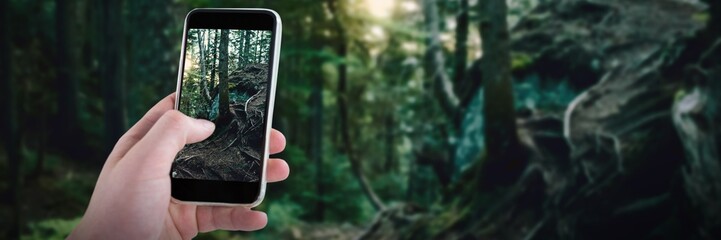 Poster - Composite image of cropped hand using mobile phone