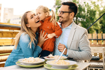 Family enjoying pasta