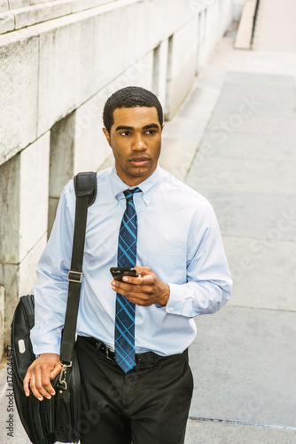 blue pants white shirt and tie
