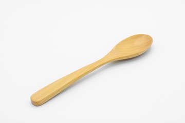 Wooden spoon isolated on white background