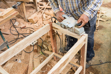 Hand of Carpenter is working in Rongngæ temple at Nan Province, Thailand.