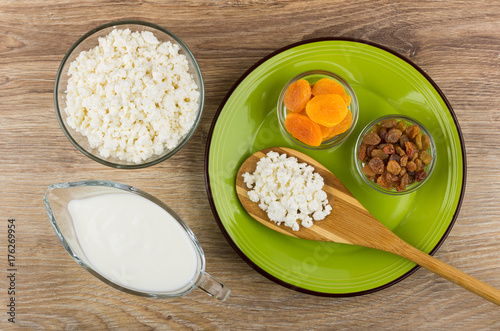 Spoon With Cottage Cheese Raisins And Dried Apricots Yogurt