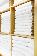 Leinwandbilder - Fresh White Hotel Towels Folded and Stacked on a Shelf.  Sanitary antivirus hygiene concept