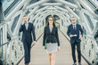 © de Art - Group of businesspeople in office building