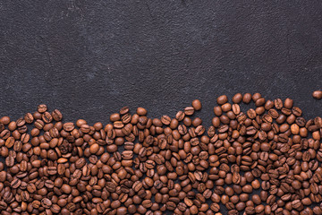 Wall Mural - Coffe beans on black background