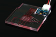© luchschenF - A lab-on-a-chip (LOC) is integration device with several laboratory functions