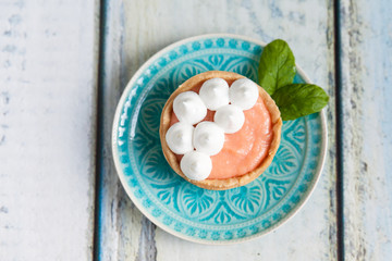 Wall Mural - Grapefruit curd tartlets with meringue on top