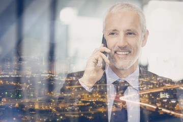 Poster - Businessman talking on mobile phone