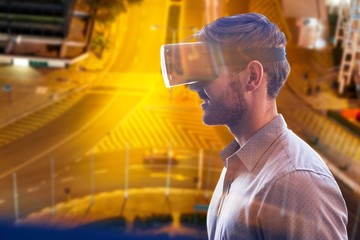 Poster - Composite image of profile view of businessman holding virtual