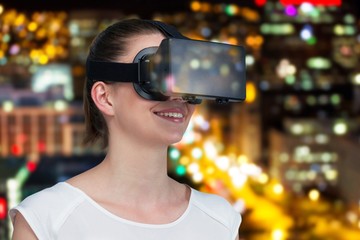 Poster - Composite image of happy woman experiencing virtual reality