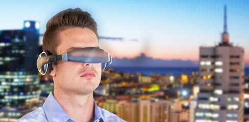 Poster - Composite image of young man wearing virtual reality simulator