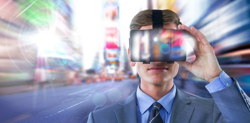 Poster - composite image of businessman in suit using virtual reality