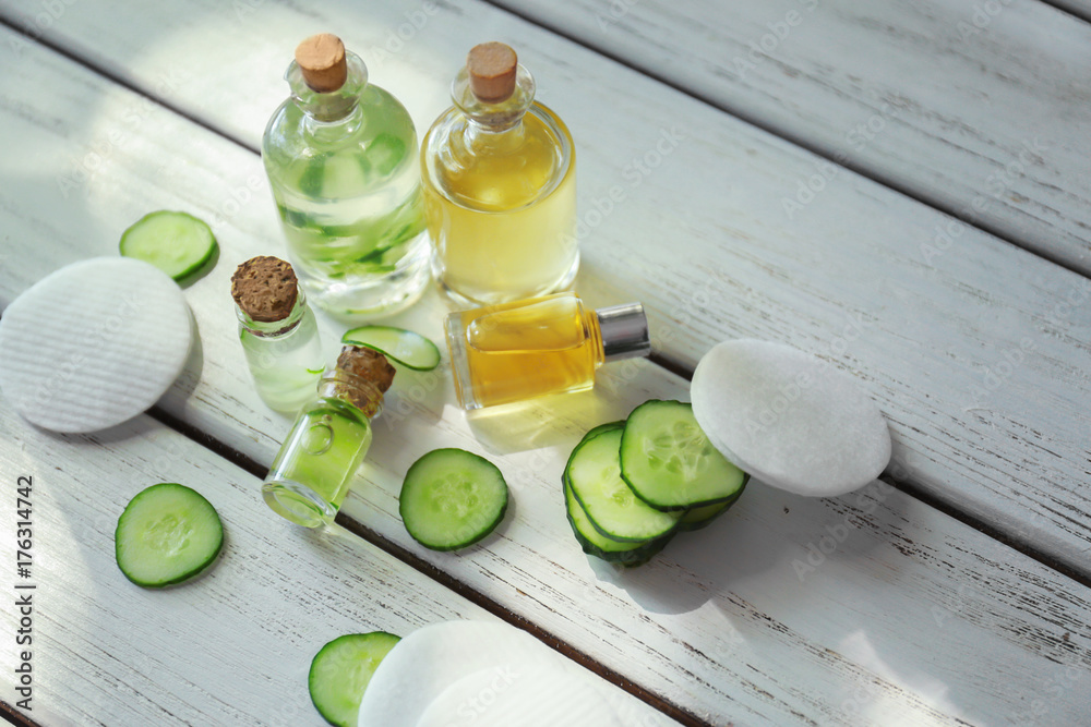 Bottles of cucumber lotion on table