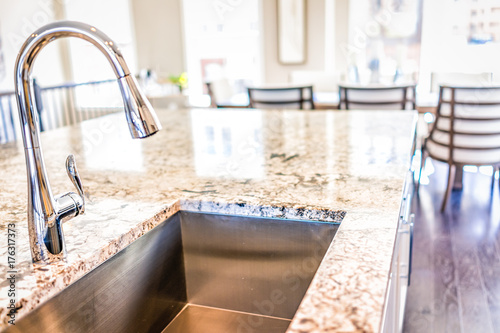 Fotomural New modern faucet and kitchen room sink closeup with island and granite countert