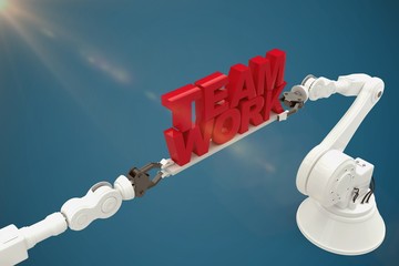 Poster - Composite image of close-up of robotic hand holding team work